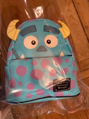Loungefly Sulley Mini Backpack - Turquoise, Purple & Yellow
